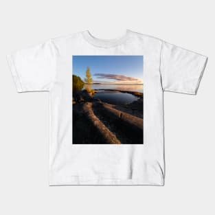 Natural rock pool in lakeshore at dawn Kids T-Shirt